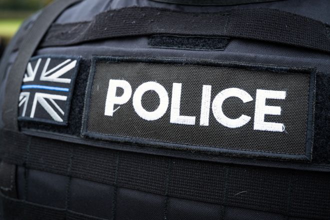 Back of Armed Response Officer