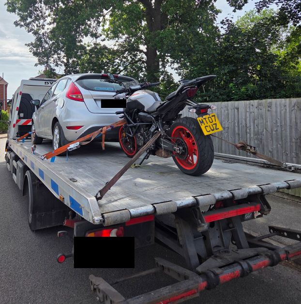 A Yamaha MT-07 picture on the back of a trailer. The Ford visible behind the motorbike is unrelated to the incident.