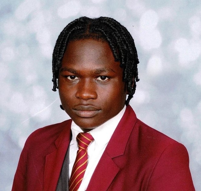 Tomiwa pictured in school uniform 
