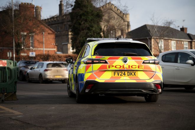 Police vehicle in a car park