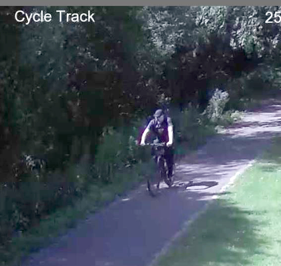 A man riding an E-bike on a cycle path 