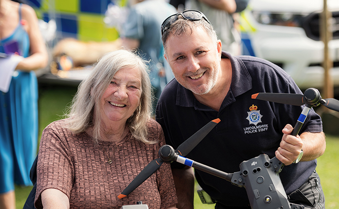 Drones operator - smiling with member of public (Kevin Taylor).jpg