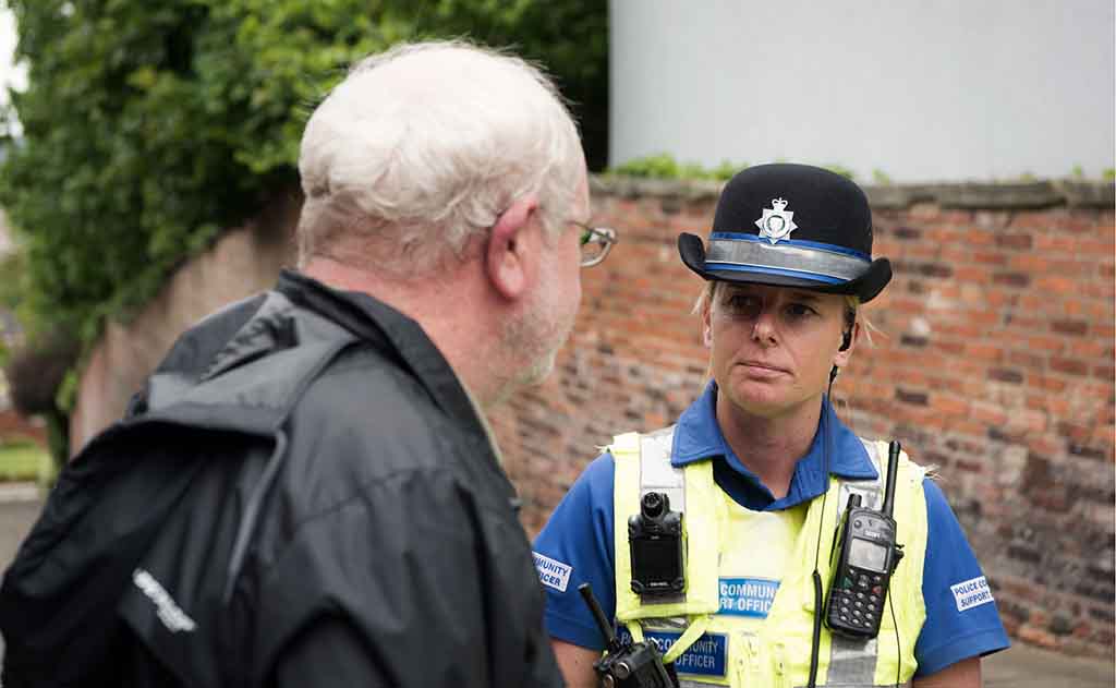 PCSO - talking to member of public (Donna Page - female)