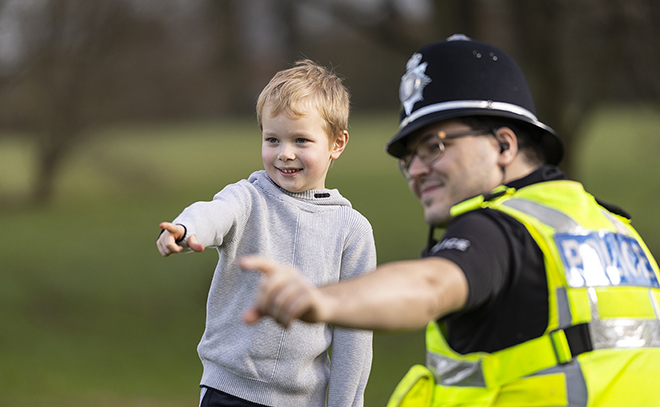 Special constable - with boy pointing into distance (Adam Brown).jpg