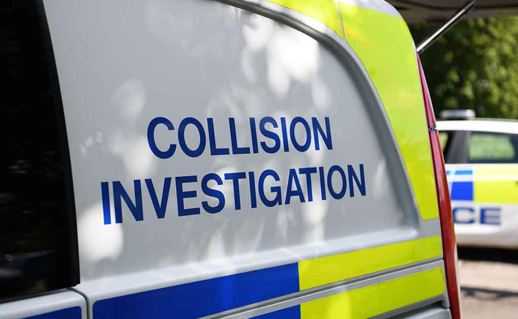 The side of a collision investigation van